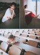 A woman sitting at a table in a classroom.