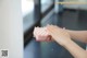 A person cleaning a wall with a sponge.